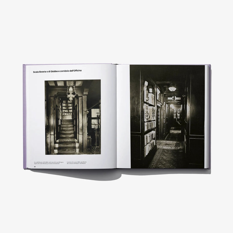 Opened photo book spread with two black-and-white corridor photographs and captions
