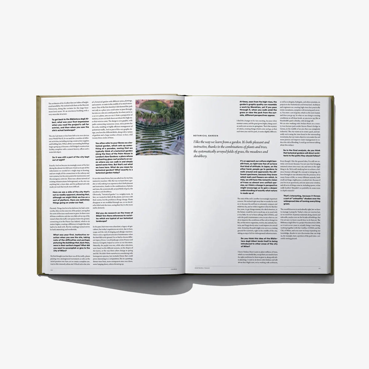 Inspiring Cities open book pages with landscape photo and columns of printed text