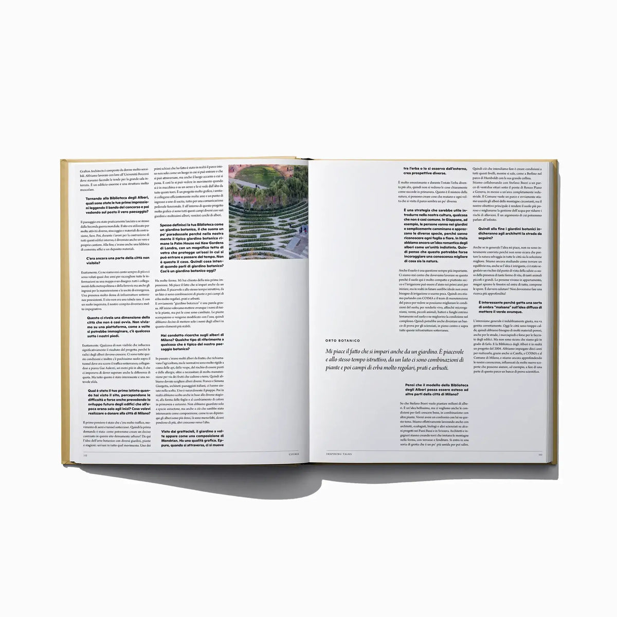 Open Italian edition city inspiration book with landscape photo inset and paragraphs