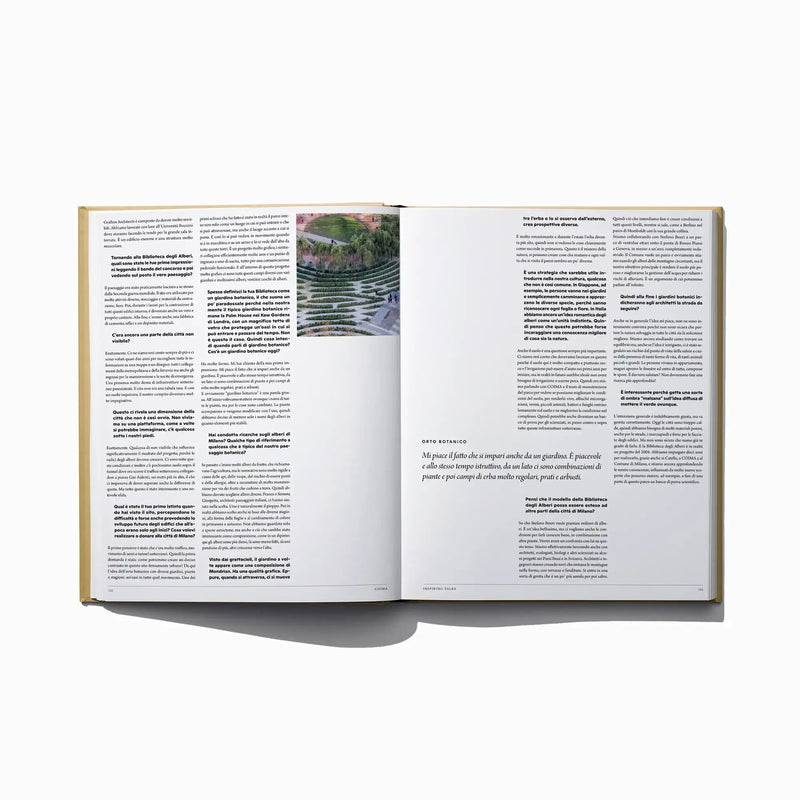 Open Italian edition city inspiration book with landscape photo inset and paragraphs