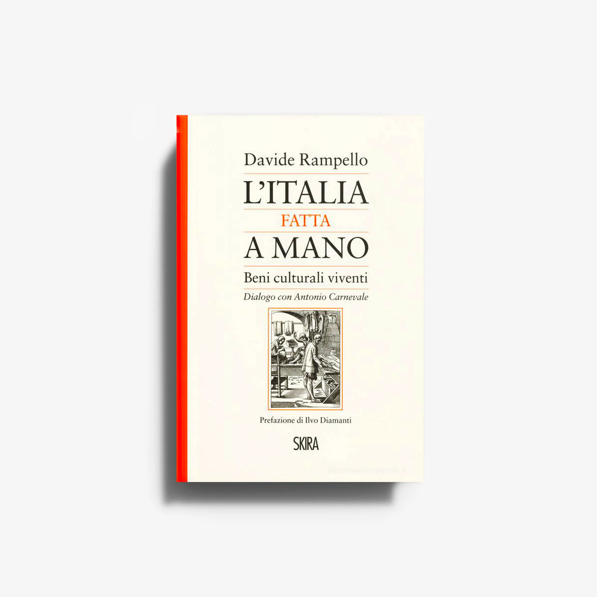 Cream book with red spine; black title and author text on illustrated cover