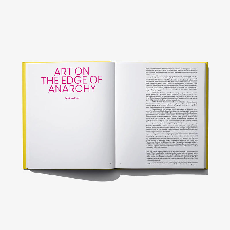 Open art book showing left title panel and right column of printed text.