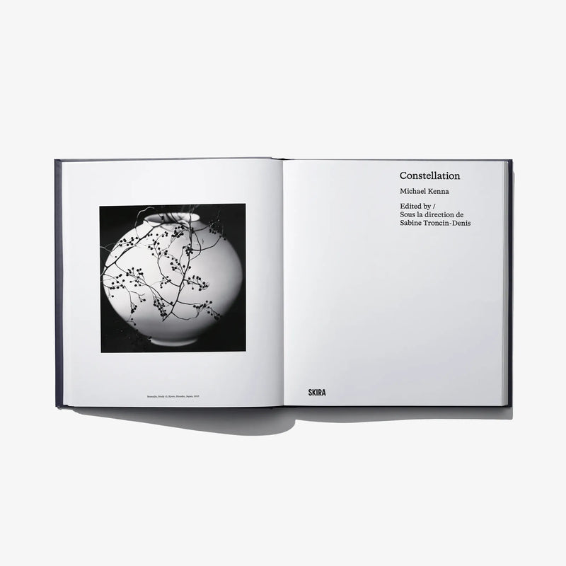 Open book “Constellation” with black-and-white photo and edition credits on right page.