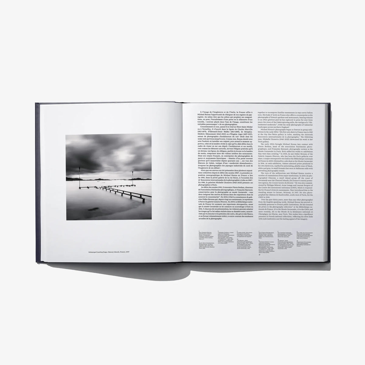 Open book “Constellation” spread with black-and-white photo on left and text on right.