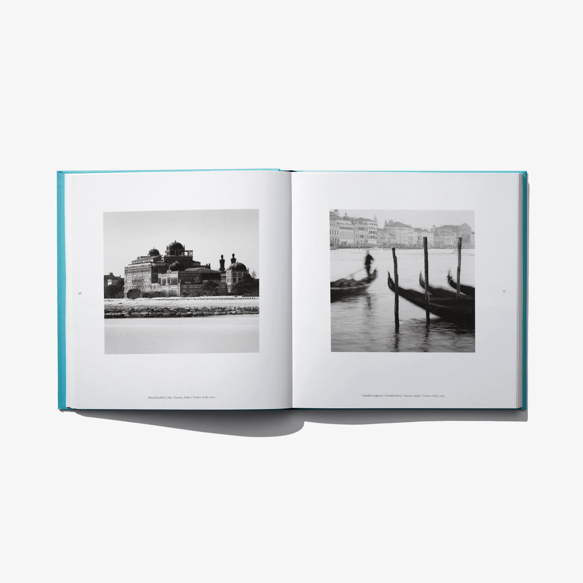 Open photo book spread with two black-and-white canal and gondola photos.