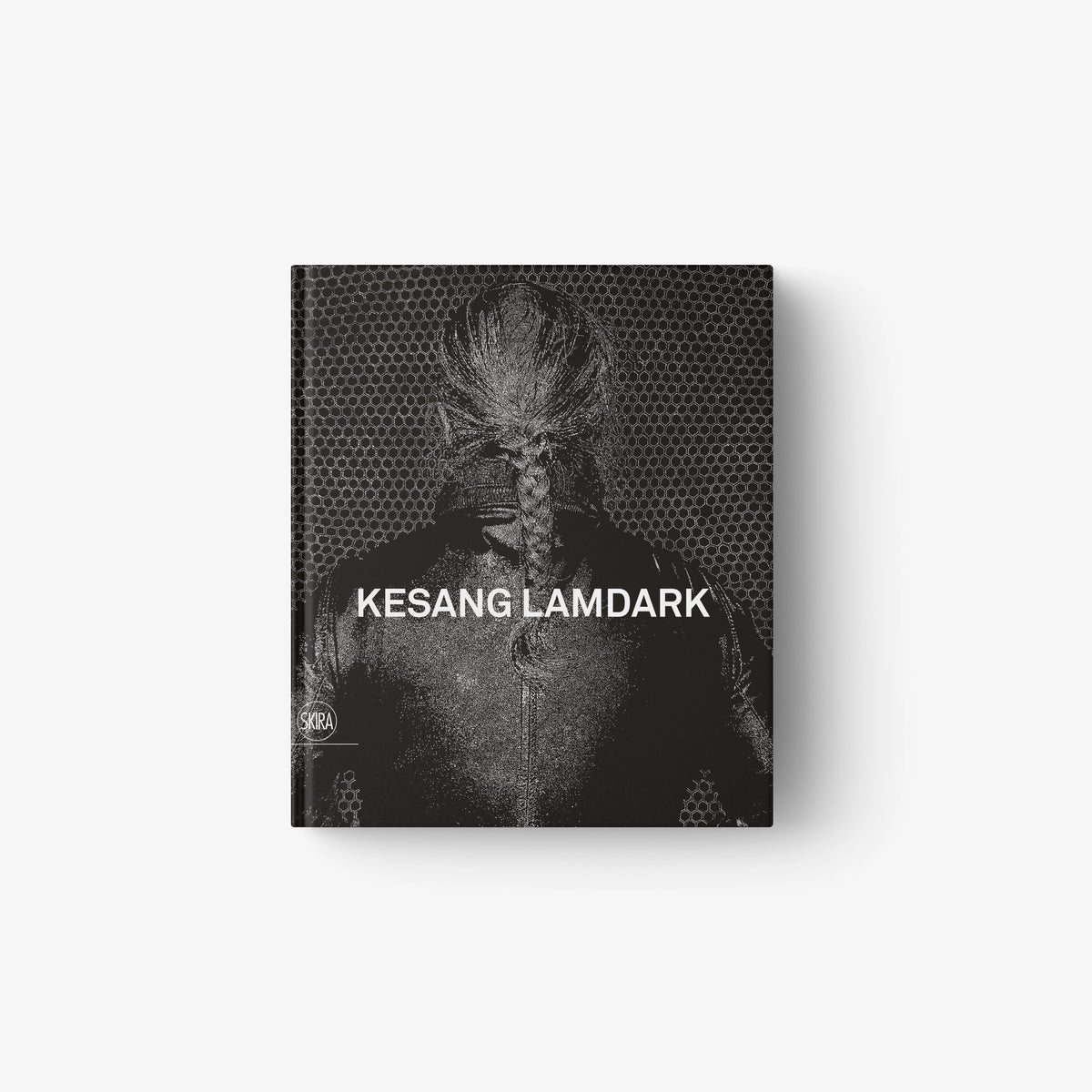 Monochrome contemporary art book cover featuring a person with braided hair seen from behind, titled Kesang Lamdark.