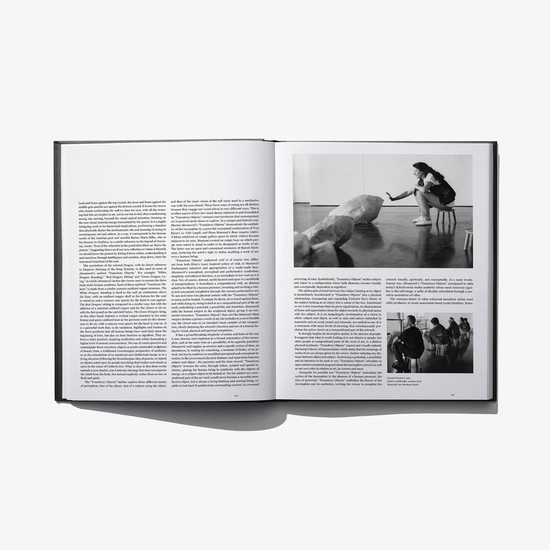 Open photo book spread with blocks of text and black-and-white action photo insets.