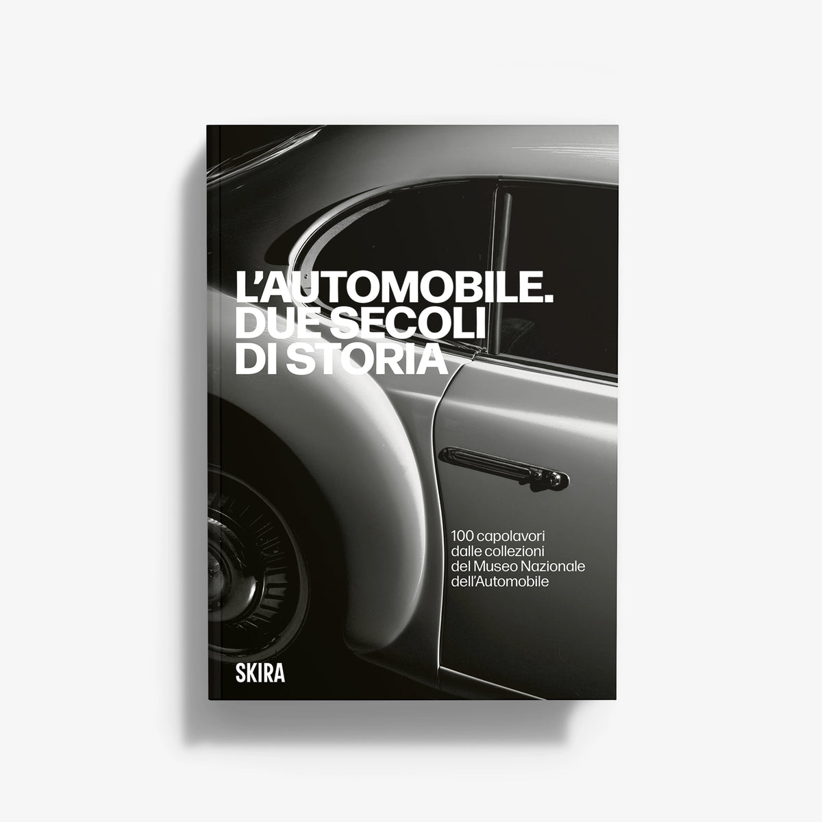 Automobile history hardcover book with black and white vintage car cover art