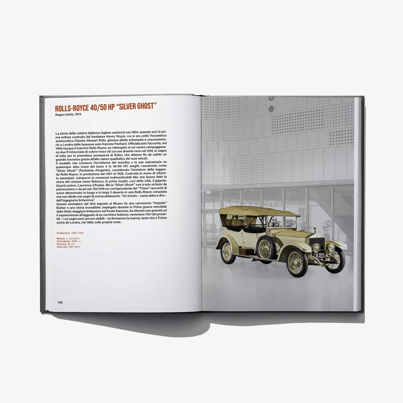 Open book spread featuring a yellow vintage car on the right page