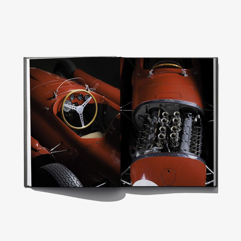 Open book spread with orange cockpit, steering wheel, and detailed engine parts
