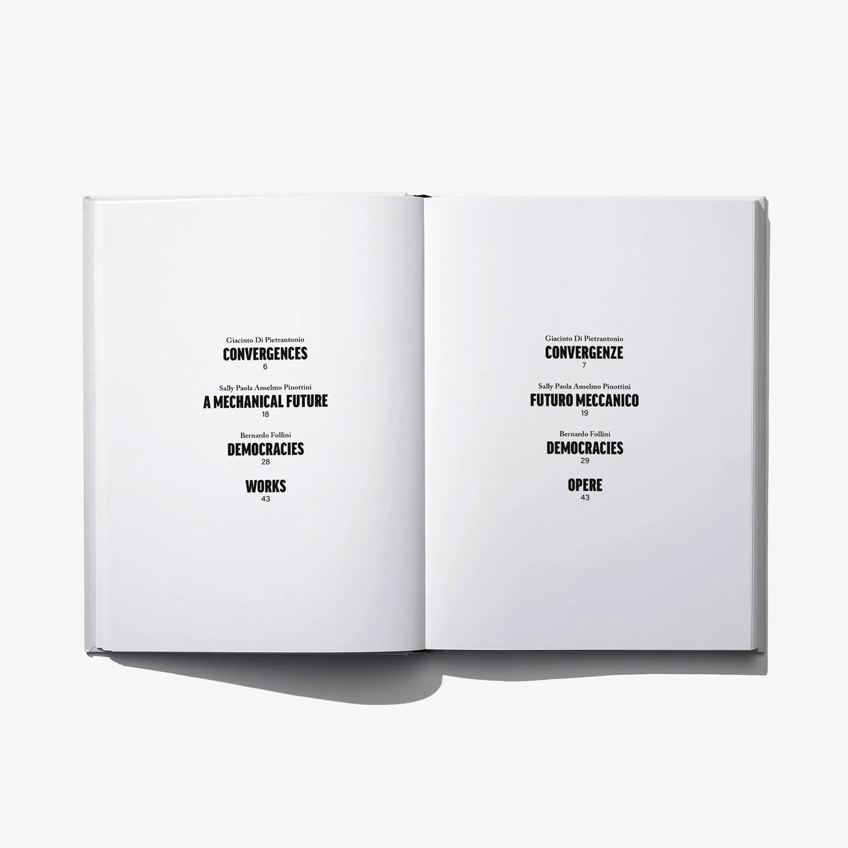 Convergences open book pages with printed section titles and subtitle