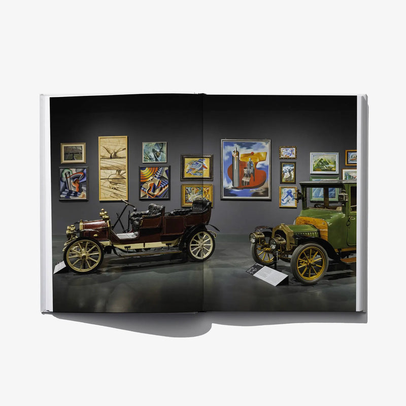Convergences open spread with vintage cars and framed artworks on walls