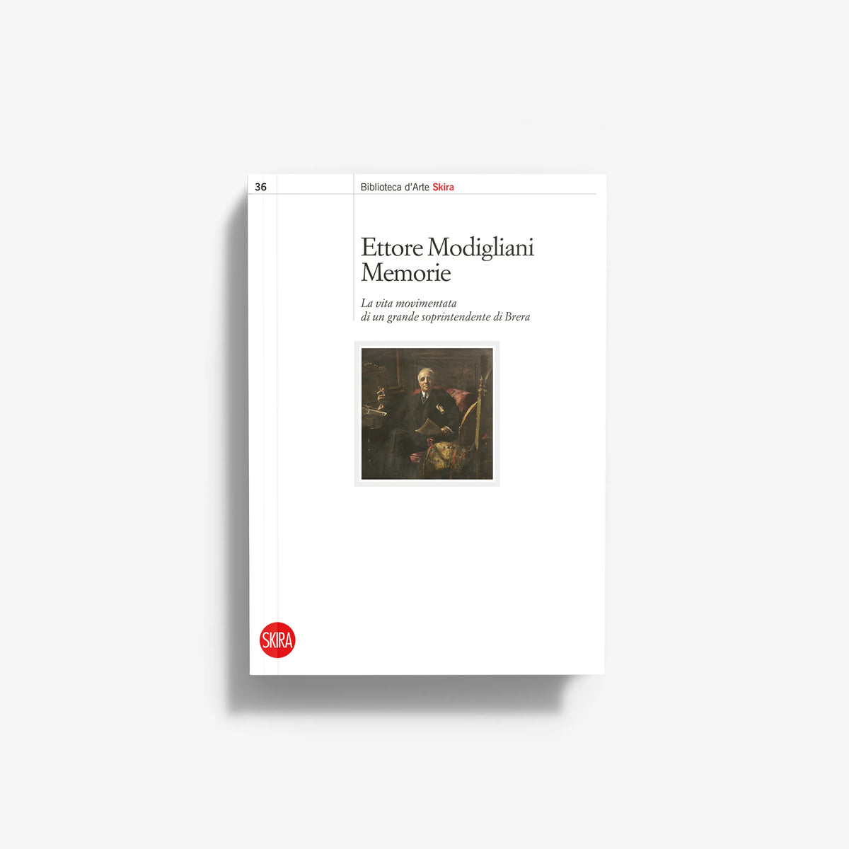 White paperback book with illustrated cover and red circular logo on bottom-left