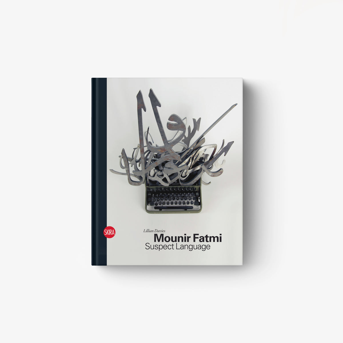 Hardcover art book with abstract calligraphy and typewriter illustration on light cover