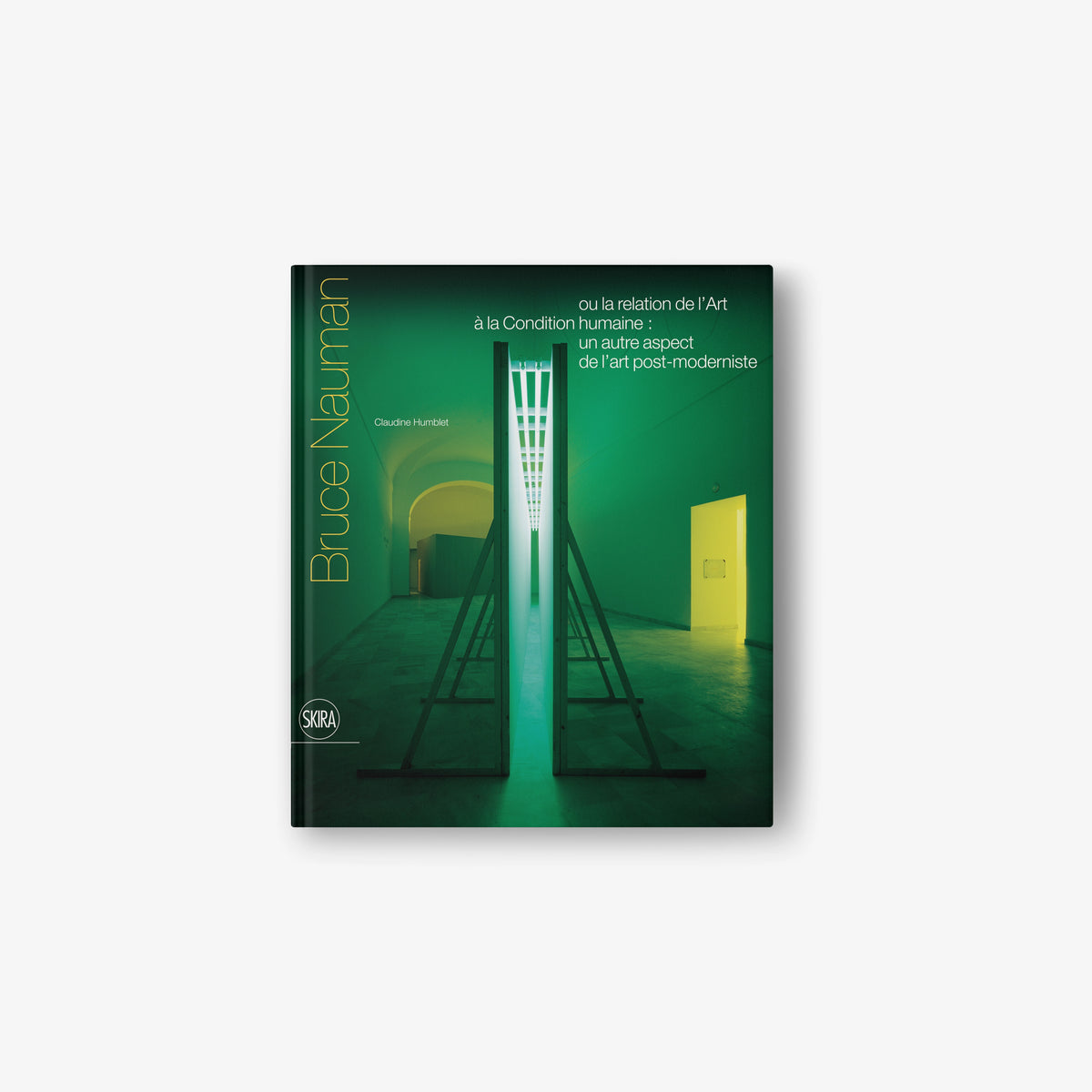 French-edition art book with green cover and architectural doorway illustration