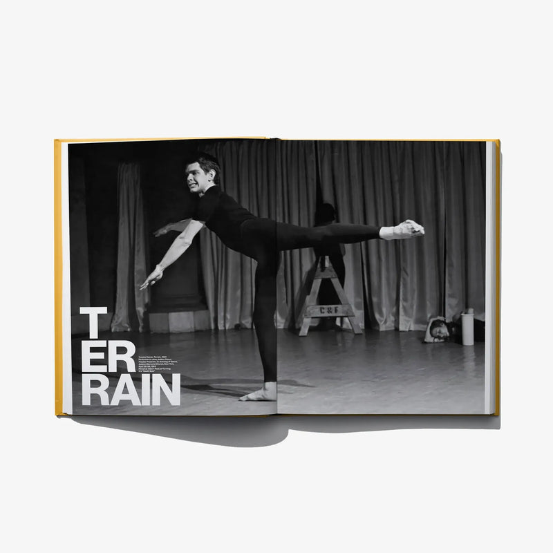 Open book spread featuring a black-and-white man onstage with “T ERRAIN” heading