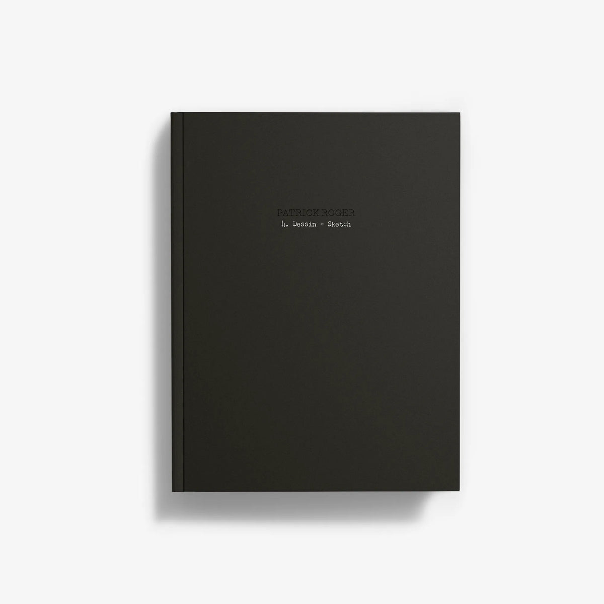 Dark gray sketchbook cover with small centered logo text