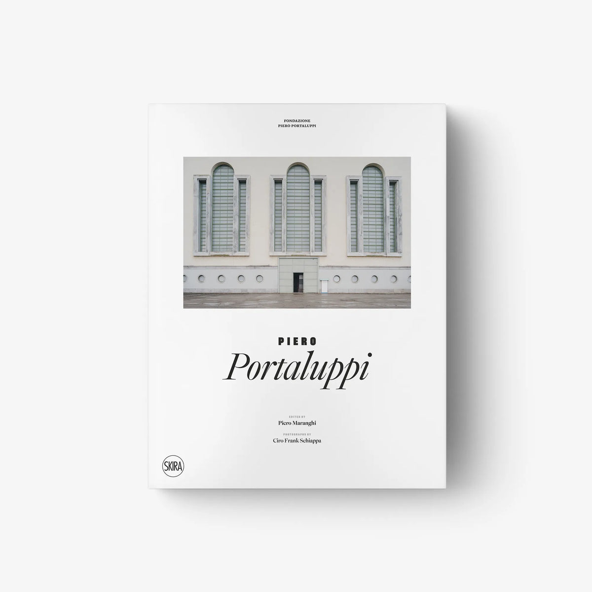 Square hardcover book cover with building photo and “Piero Portaluppi” script title.