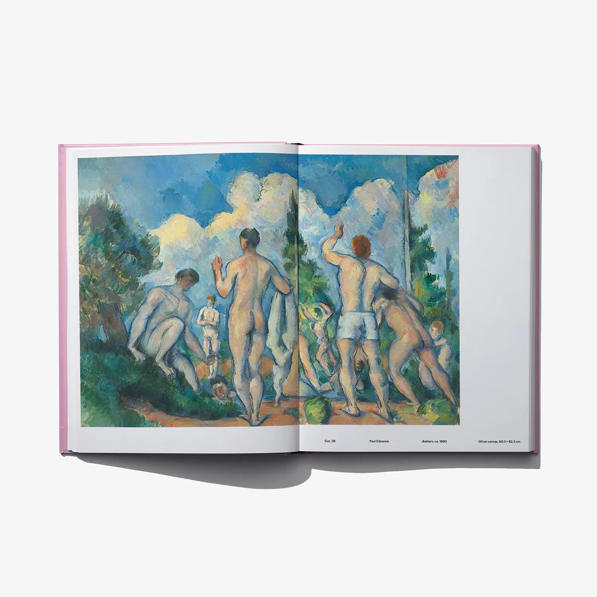Open art book showing a post-impressionist painting of people outdoors