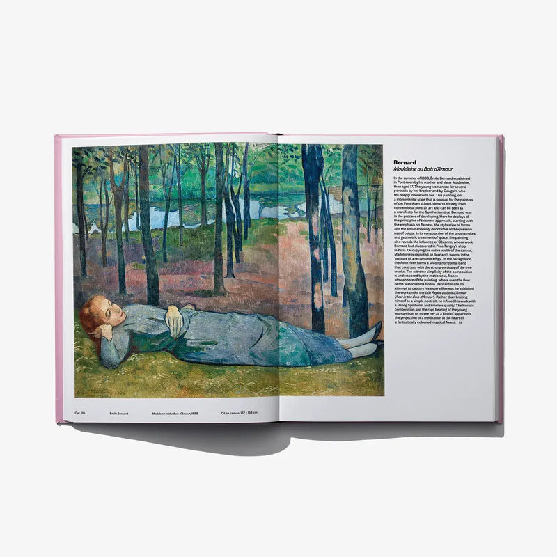 Open art book with painting of a man lying in woods; text column on right