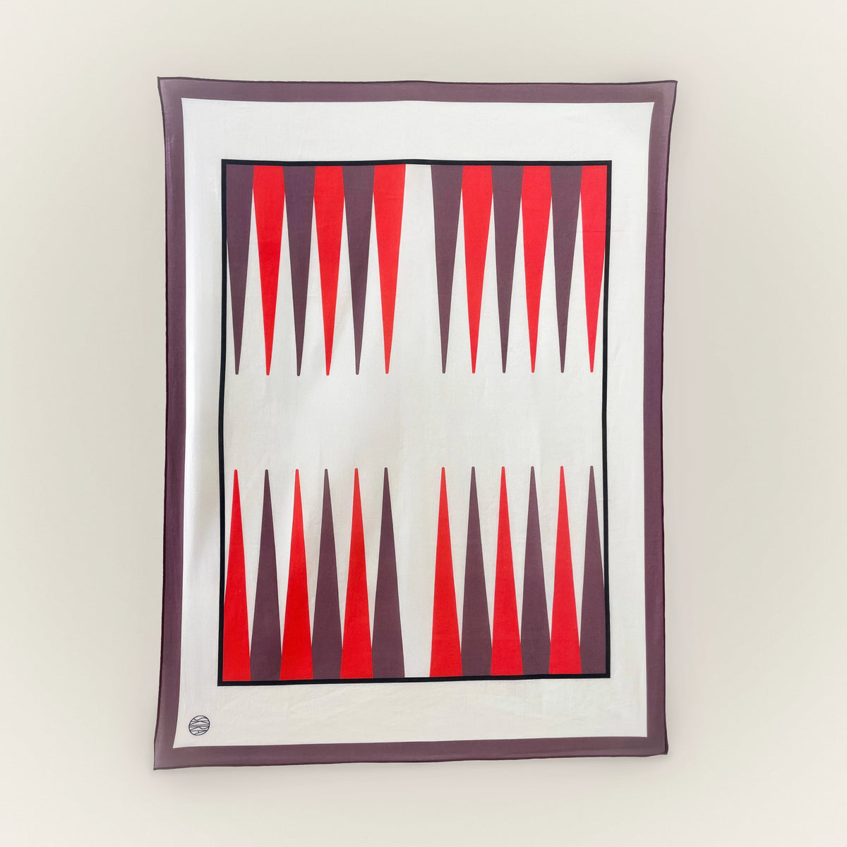 Red backgammon pattern scarf with black and white stripes, folded