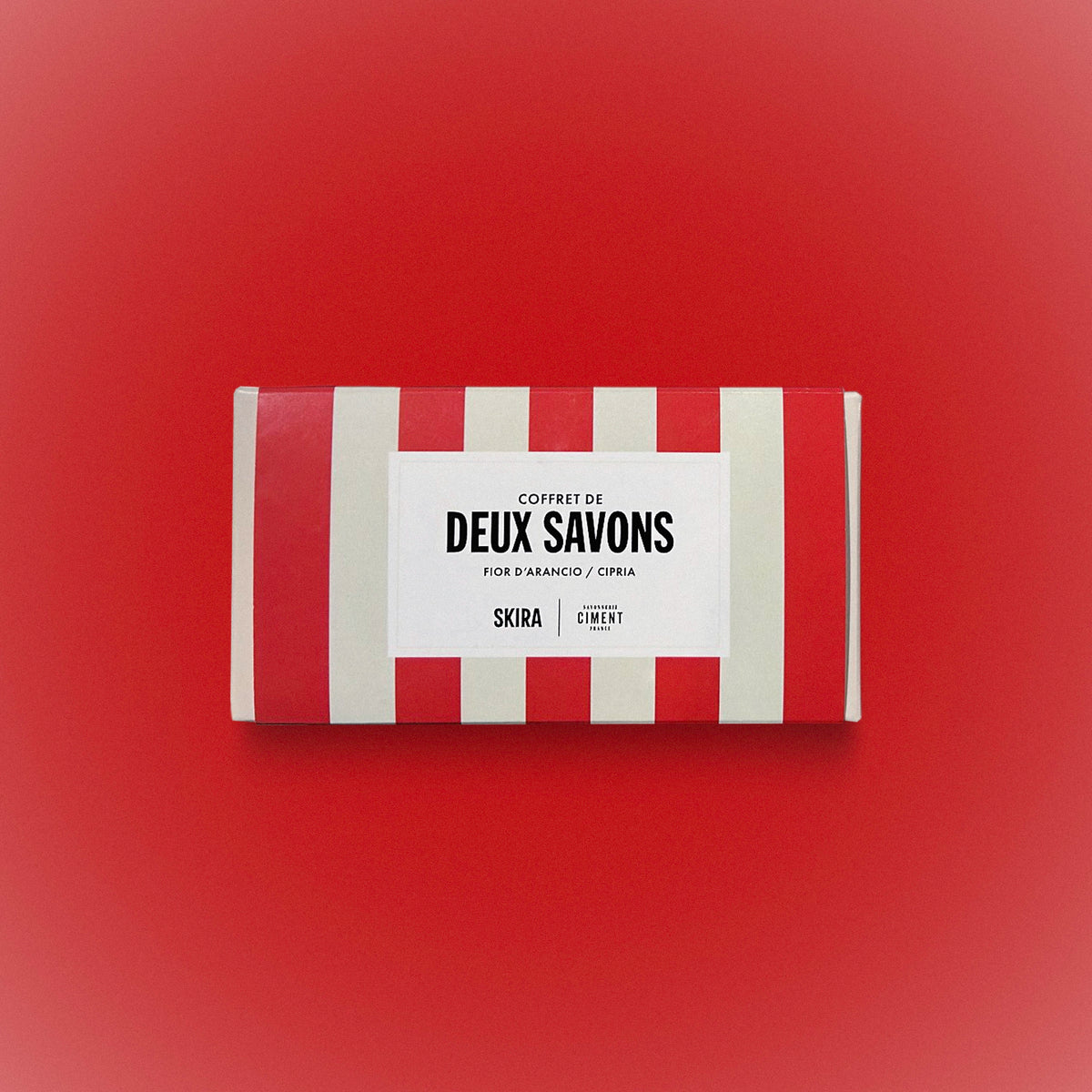 Soap duo gift box with red and white striped sleeve and SKIRA CIMENT label