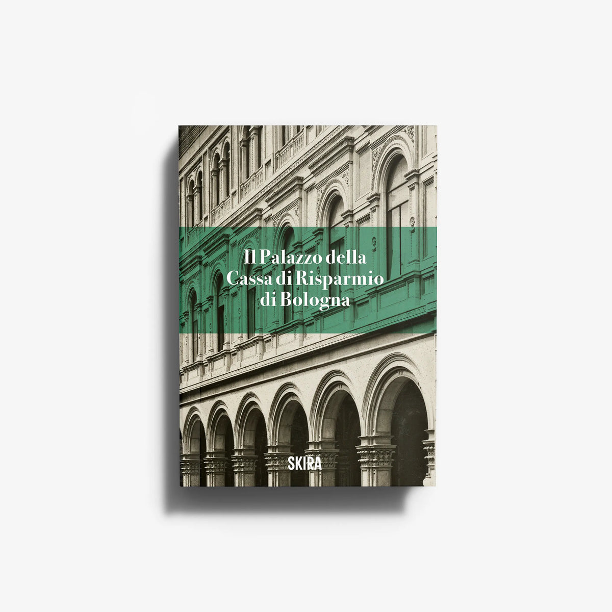 Architectural book cover with stone building facade, green band, and arched windows