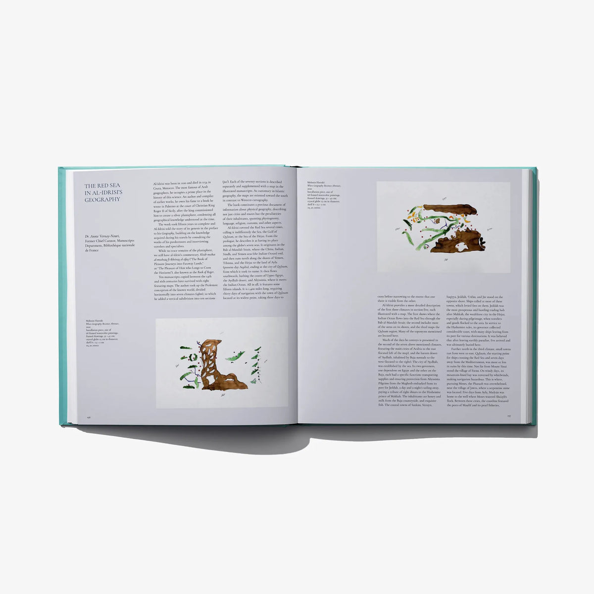 Open museum book spread featuring illustrated panels and paragraphs of text