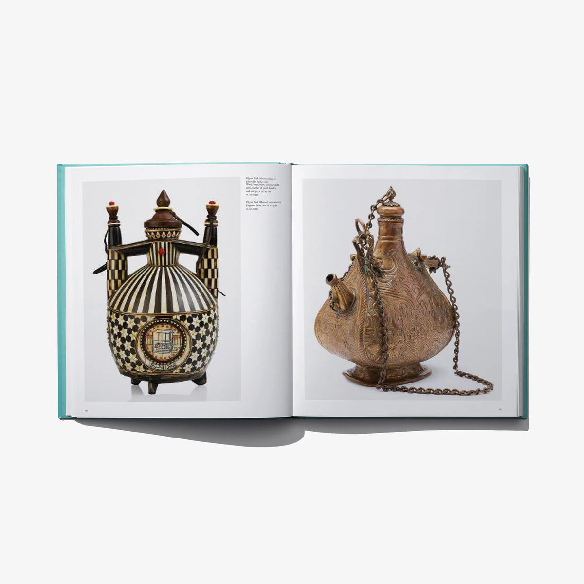 Open museum book spread showing ornate decorative vessels with captions and text