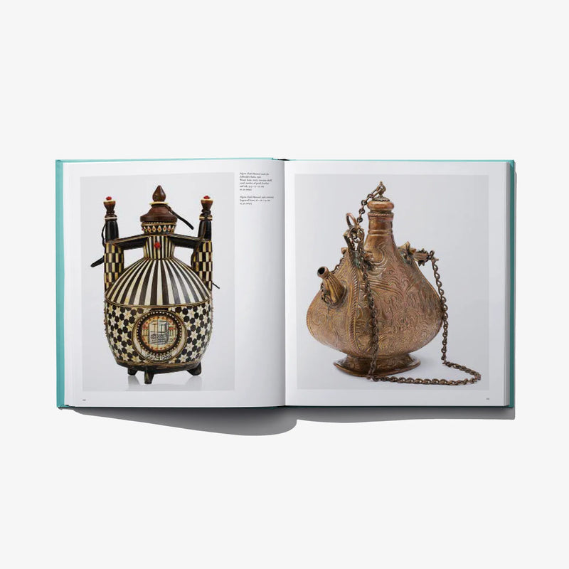 Open museum book spread showing ornate decorative vessels with captions and text