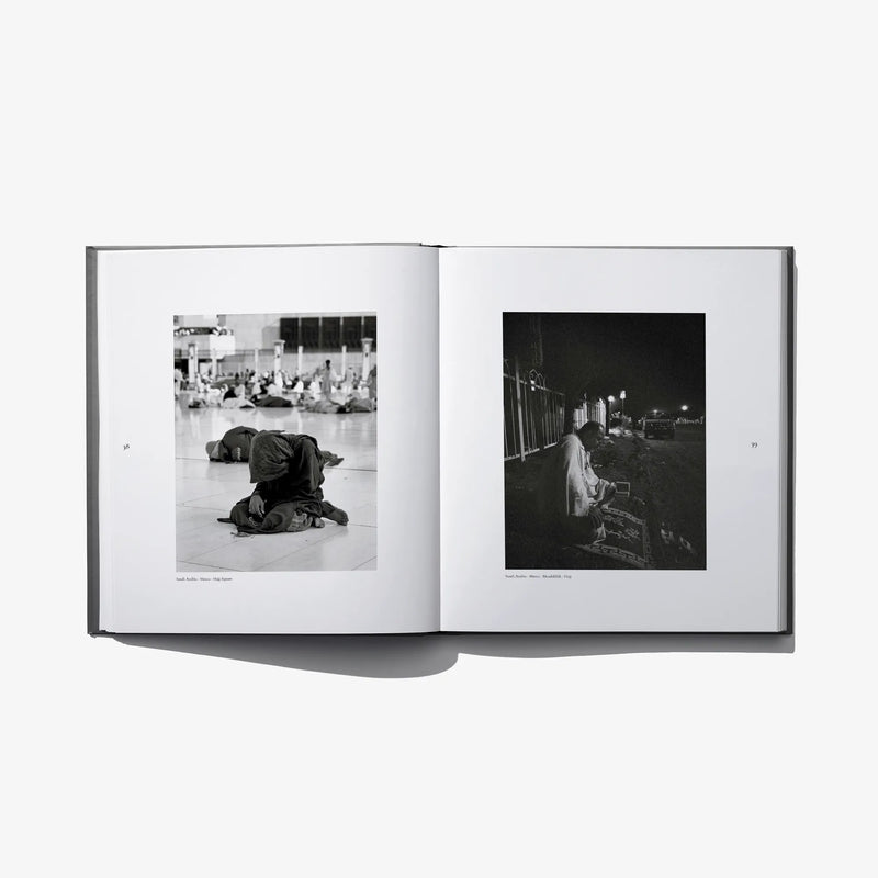 Open photo book spread with people in indoor night scenes, black-and-white photographs