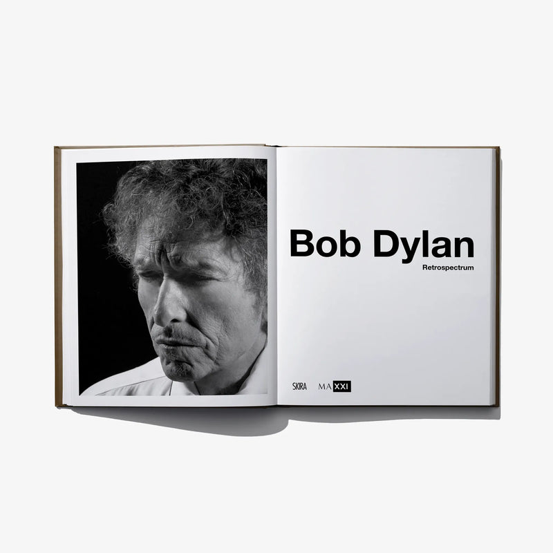 Open book with black-and-white portrait photo and title text on right
