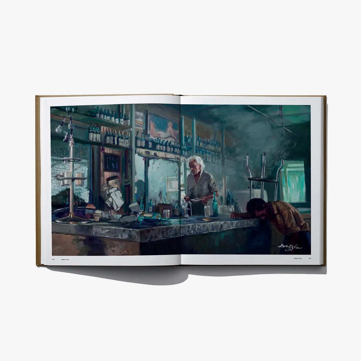 Hardcover photo book open to bar interior scene photograph