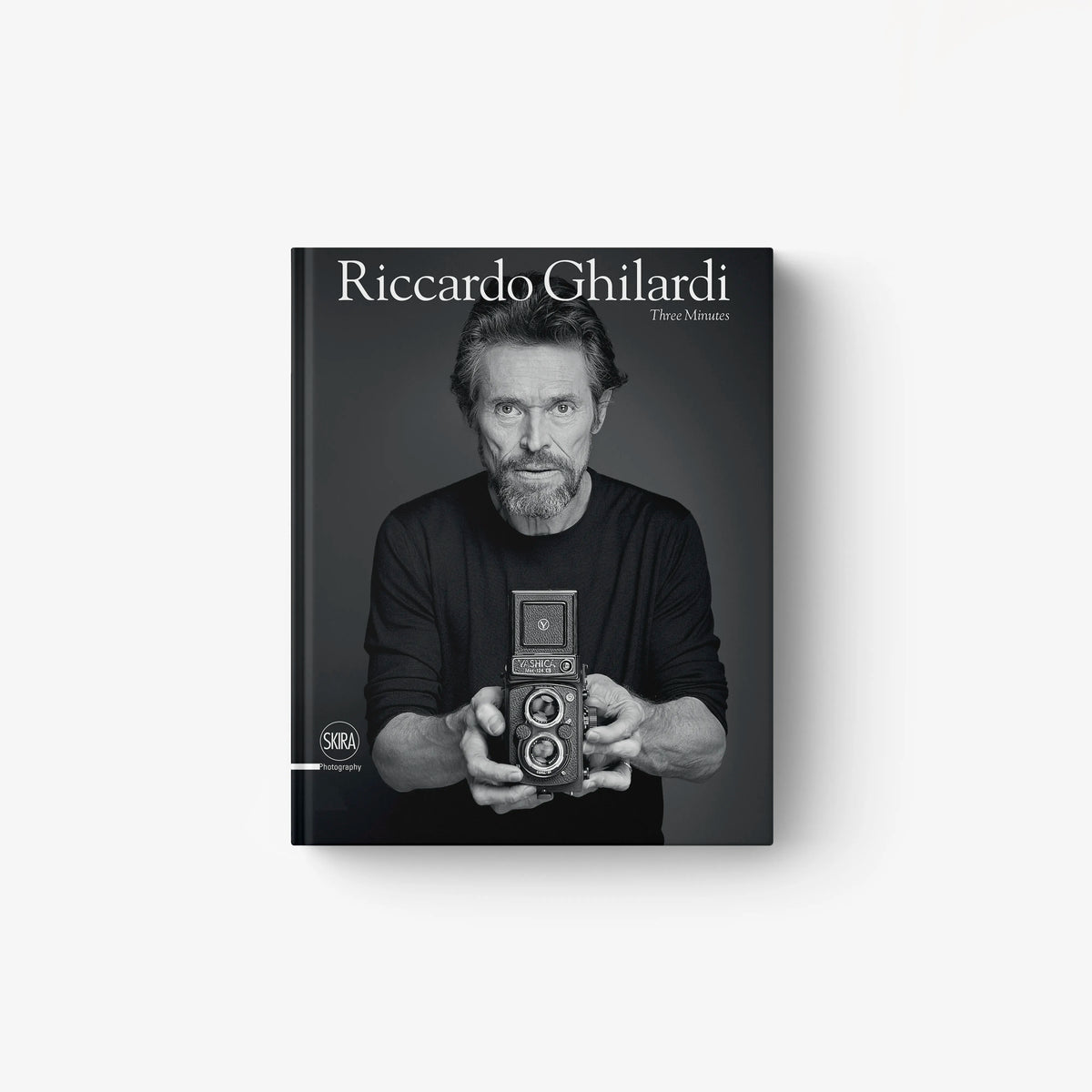 Hardback portrait photography book in black with Riccardo Ghilardi and Skira Arte, featuring celebrity portraits at film festivals