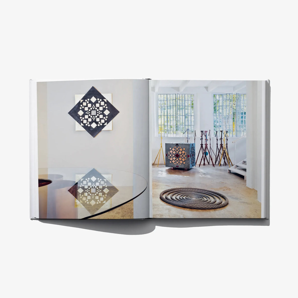 Italian edition art book open spread with interior photo and diamond mosaic graphic