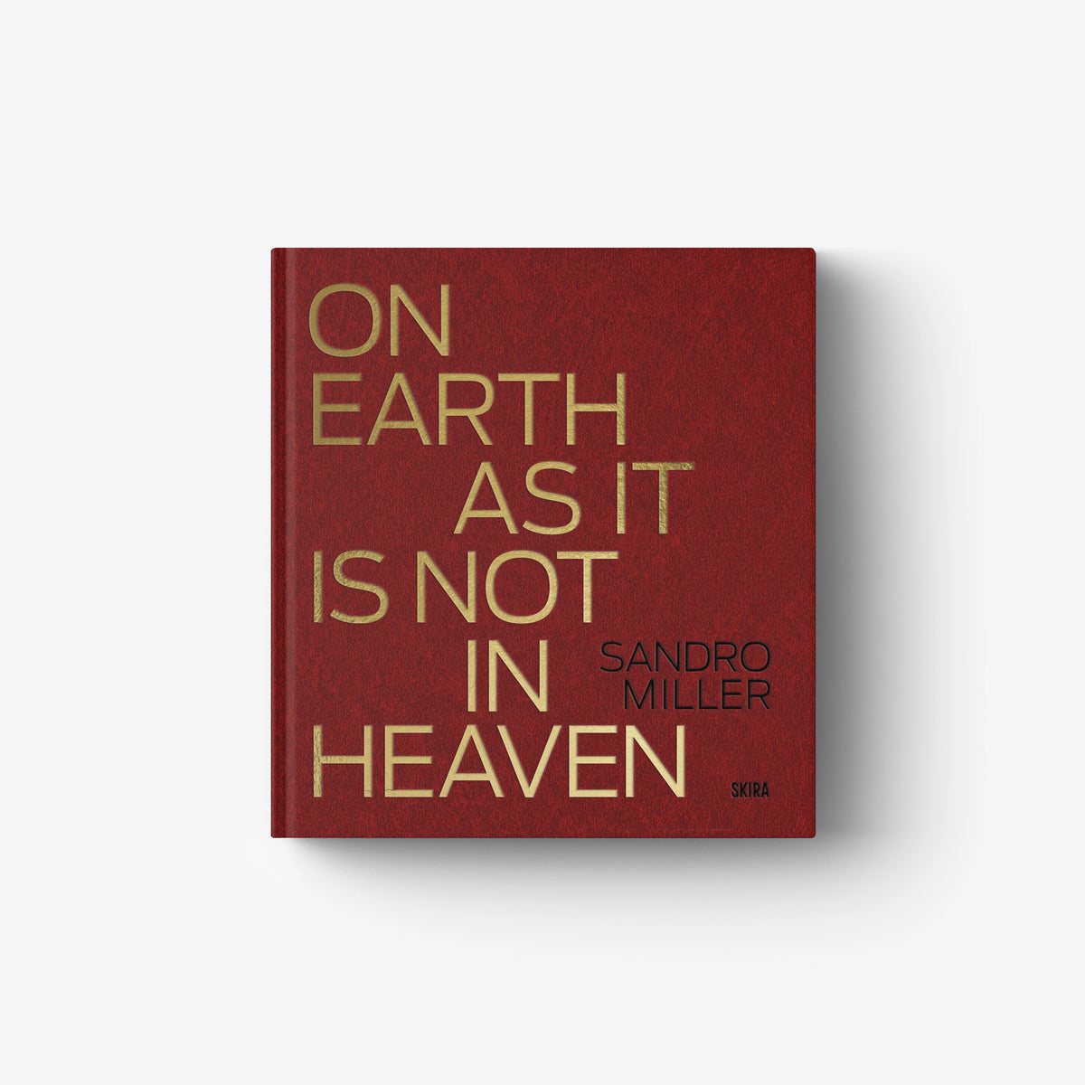 Limited edition book with dark red cover and gold typographic title text