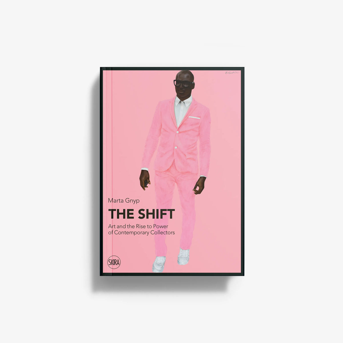 Book titled 'The Shift' with pink cover and portrait of a man in a suit.