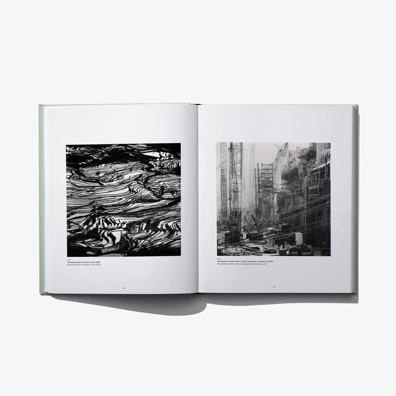 Open photo book spread with black-and-white abstract patterns and industrial buildings.