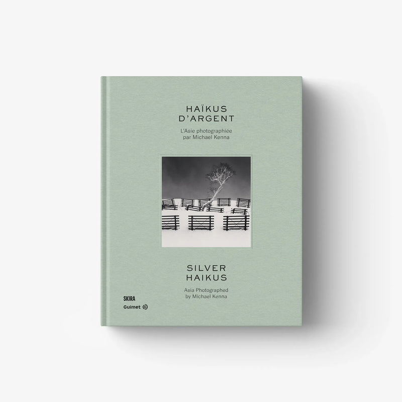 Mint green photo book cover with small landscape thumbnail and centered title.