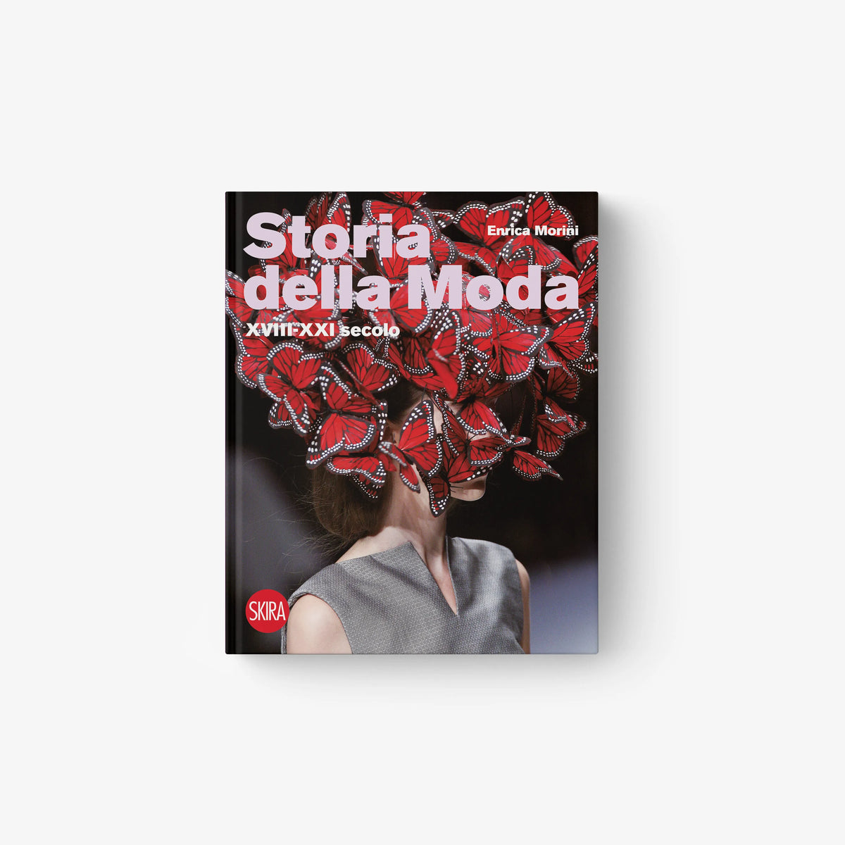 Fashion history book by Skira Arte with red and black butterfly cover, XVIII to XXI secolo section