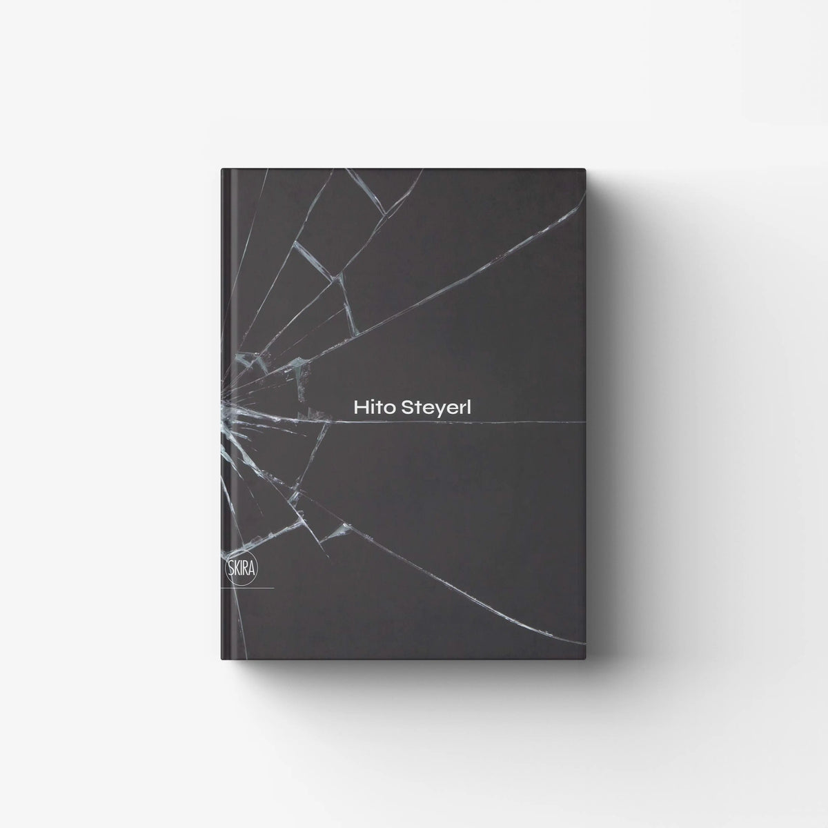 Contemporary art book in dark grey with white line artwork, Skira Arte, Hito Steyerl, anthology of essays and interviews