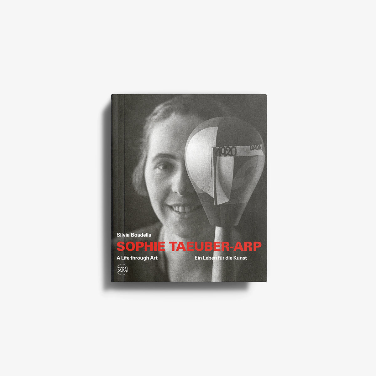Contemporary art portrait print by Skira Arte, dark grey book cover with Sophie Taeuber-Arp face and geometric shapes