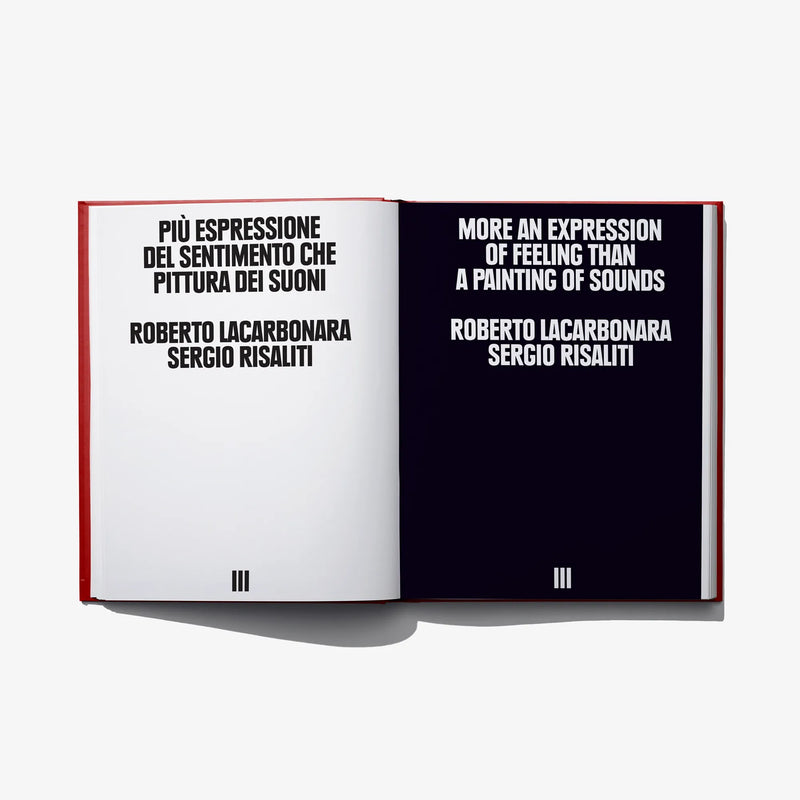 Open photo book spread with printed text and dark-themed page layout