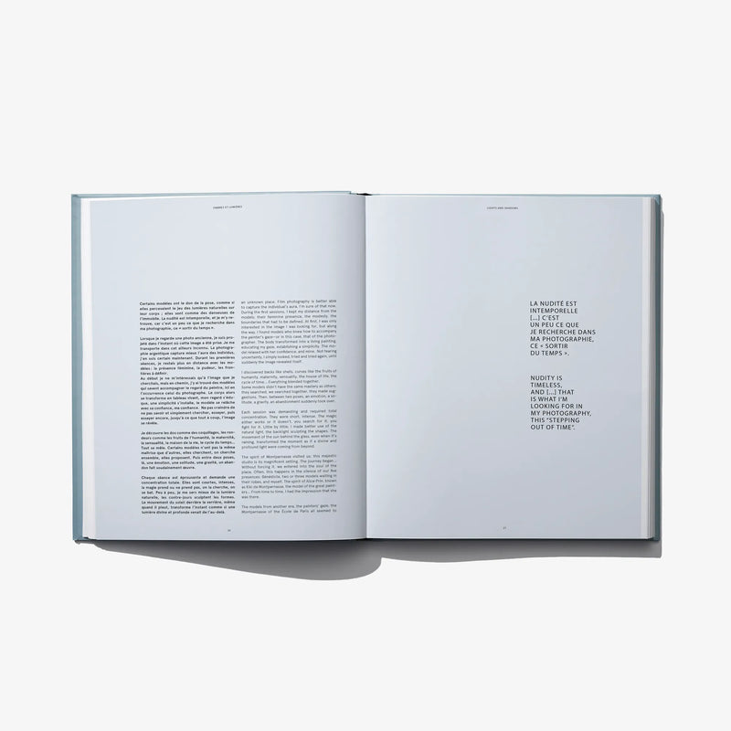Open book spread with two-page layout and blocks of printed text