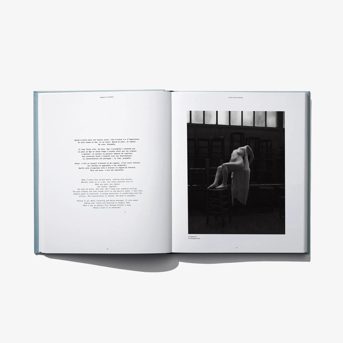 Open book spread with black-and-white photo of a seated figure on right page
