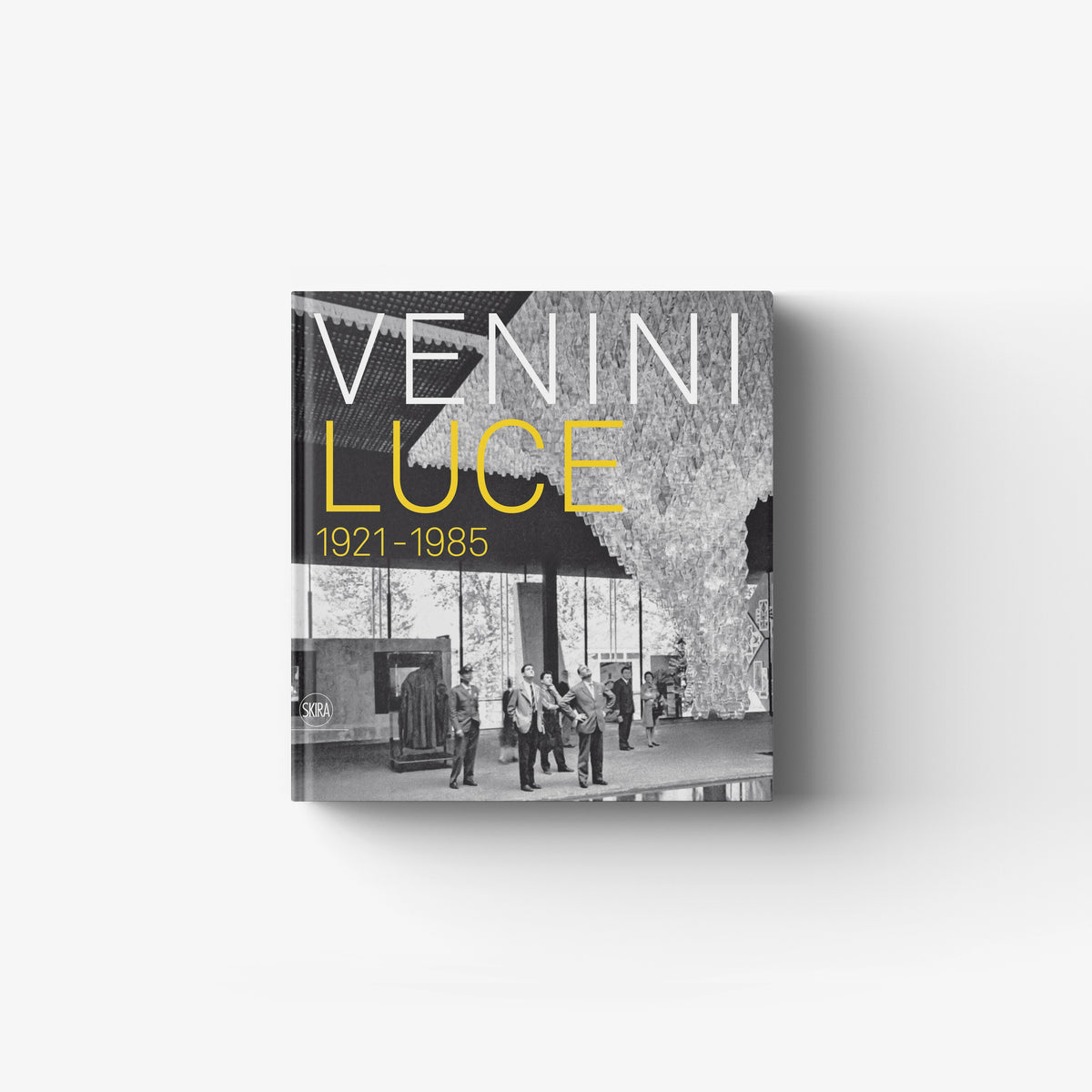Art book Venini Luce 1921 1985 by Skira Arte with black and grey cover and illustrated glass design