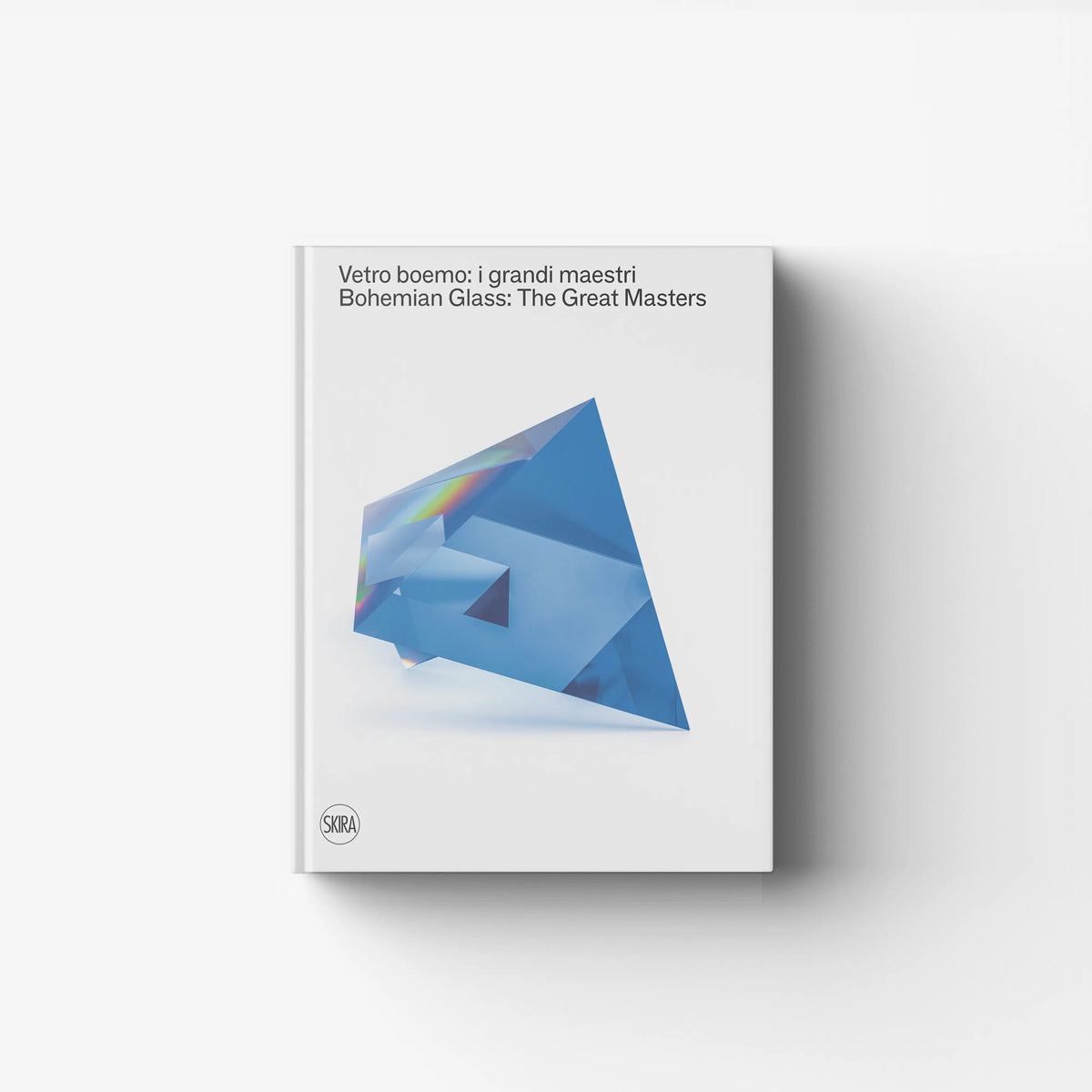 Art book in glass by Skira Arte with blue cover and reflective geometric artwork, featuring six contemporary glass sculptors