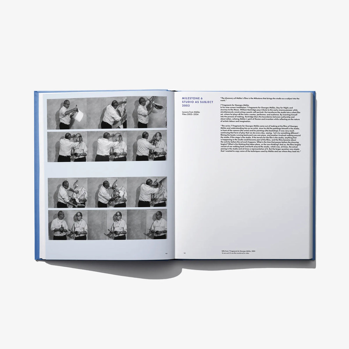Open art book spread with black-and-white portrait layout and dense text block