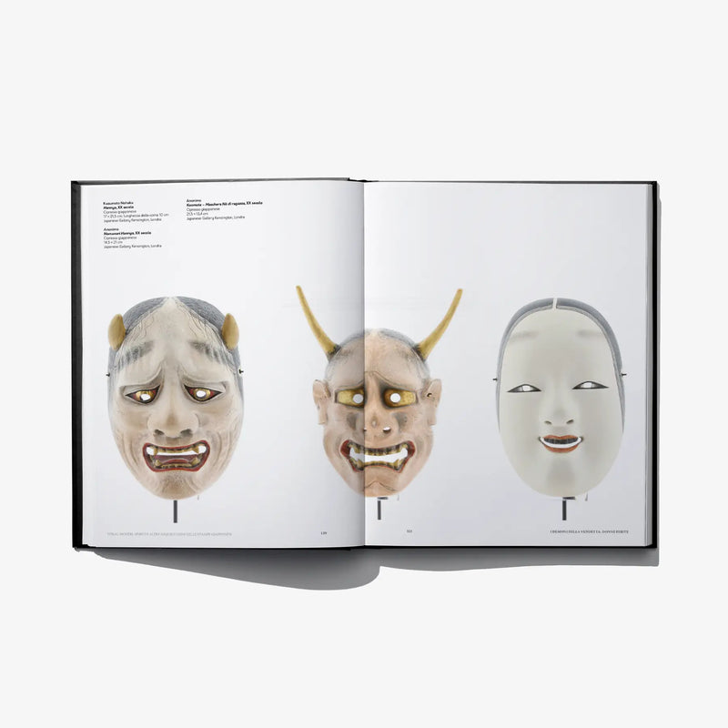 Open book spread with three yokai masks on stands, front views