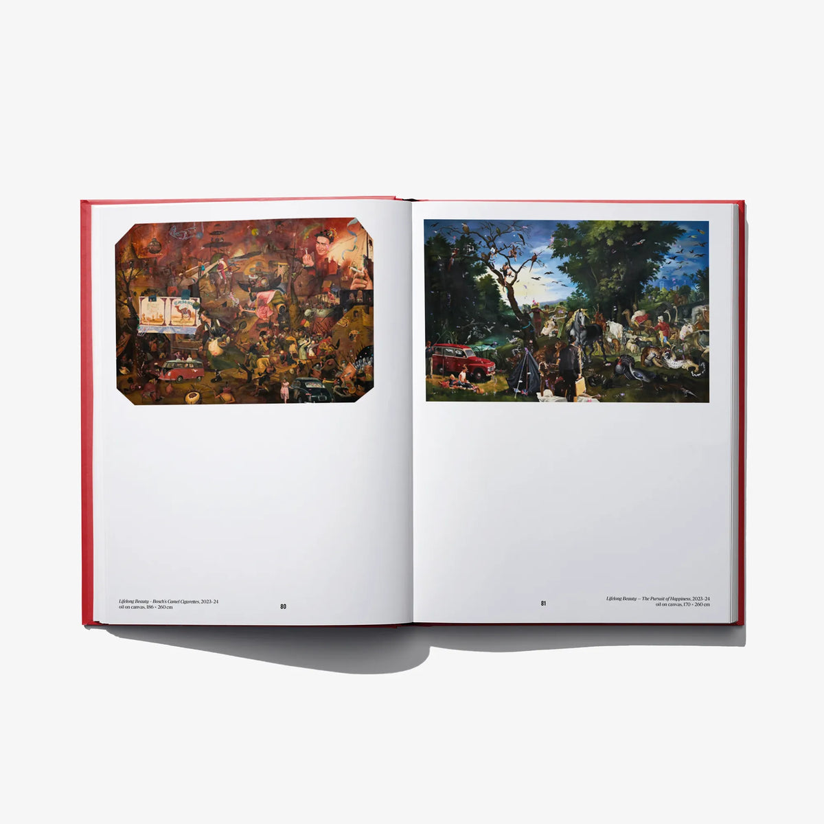 Open book spread showing two framed painting illustrations side by side